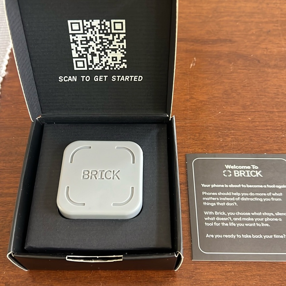 NEW IN BOX Brick Phone Silencer. Grey.
